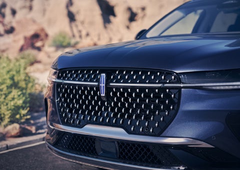 The stylish grille of a 2024 Lincoln Nautilus® SUV sparkles in the sunlight. | Carman Lincoln in New Castle DE