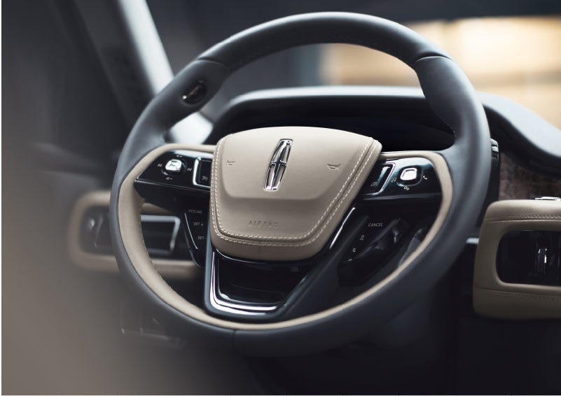 The intuitively placed controls of the steering wheel on a 2023 Lincoln Aviator® SUV | Carman Lincoln in New Castle DE