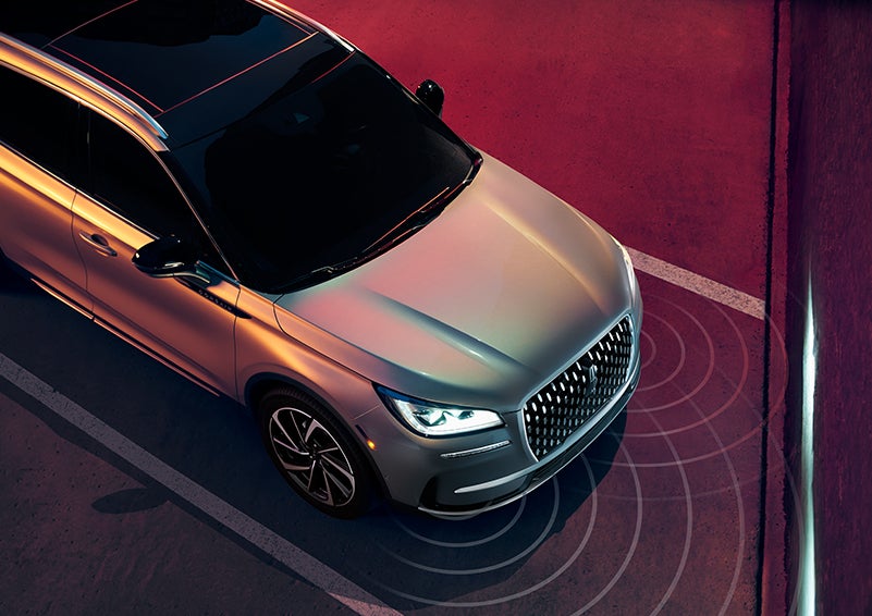 Illustrated radar signals are shown emitting from the front of a 2023 Lincoln Corsair® SUV. | Carman Lincoln in New Castle DE