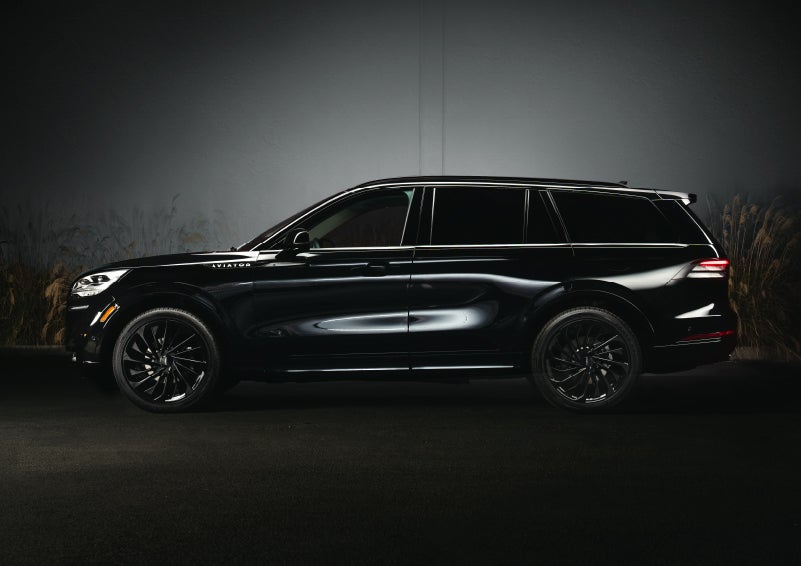 A 2024 Lincoln Aviator® SUV is shown in the Infinite Black exterior color | Carman Lincoln in New Castle DE