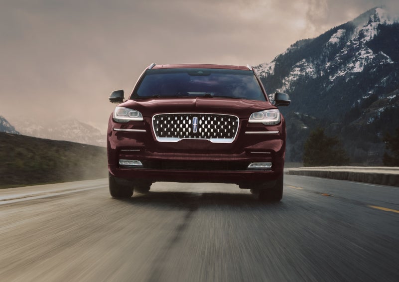 A 2024 Lincoln Aviator® SUV is shown in the Diamond Red exterior color. | Carman Lincoln in New Castle DE