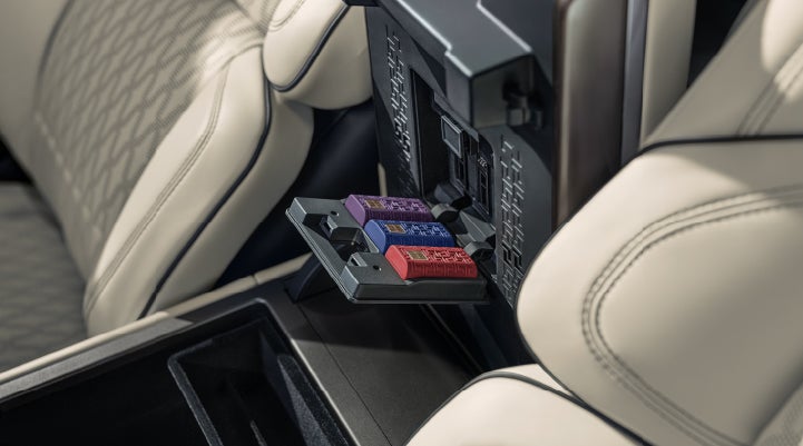 Digital Scent cartridges are shown in the diffuser located in the center arm rest. | Carman Lincoln in New Castle DE