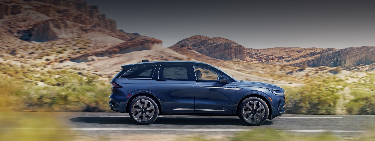 A 2024 Lincoln Nautilus® SUV is being driven in a desert setting. | Carman Lincoln in New Castle DE