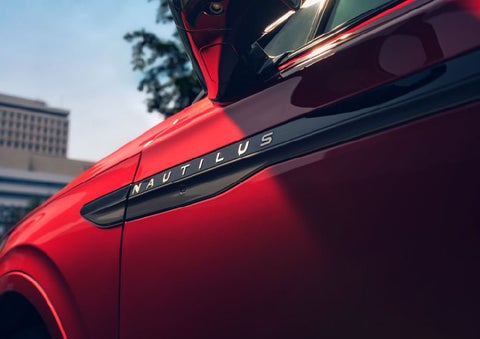 A side badge on the passenger door reads Nautilus. | Carman Lincoln in New Castle DE
