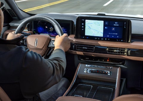A person is driving a 2026 Lincoln Aviator® SUV as seen from inside the cabin. | Carman Lincoln in New Castle DE