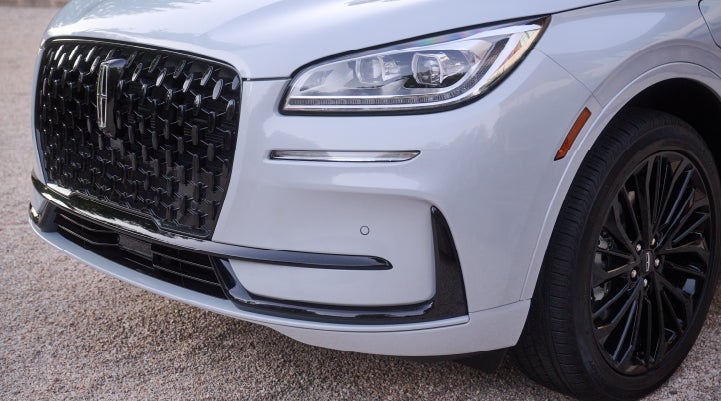 The all-black grille of the available Jet Appearance Package on a 2026 Lincoln Corsair® SUV is shown. | Carman Lincoln in New Castle DE