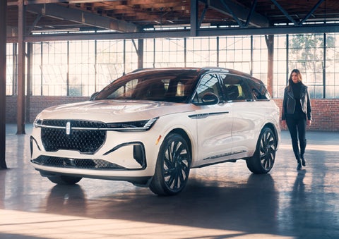 A person approaches a 2026 Lincoln Nautilus® SUV. | Carman Lincoln in New Castle DE